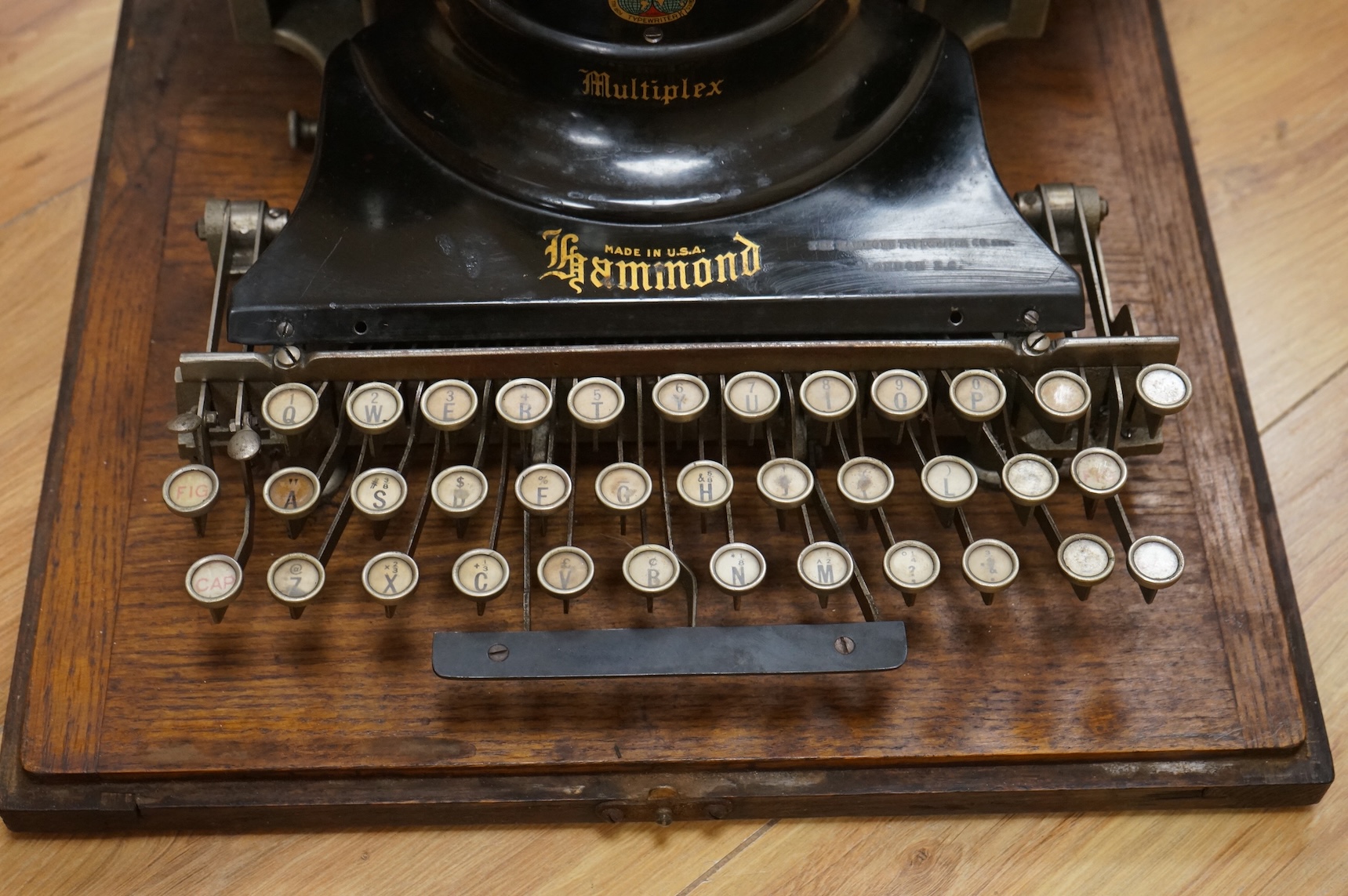 An early 20th century oak and tinplate Hammond Multiplex typewriter, Made in U.S.A.